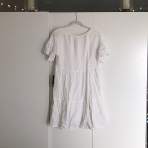 White linen dress.